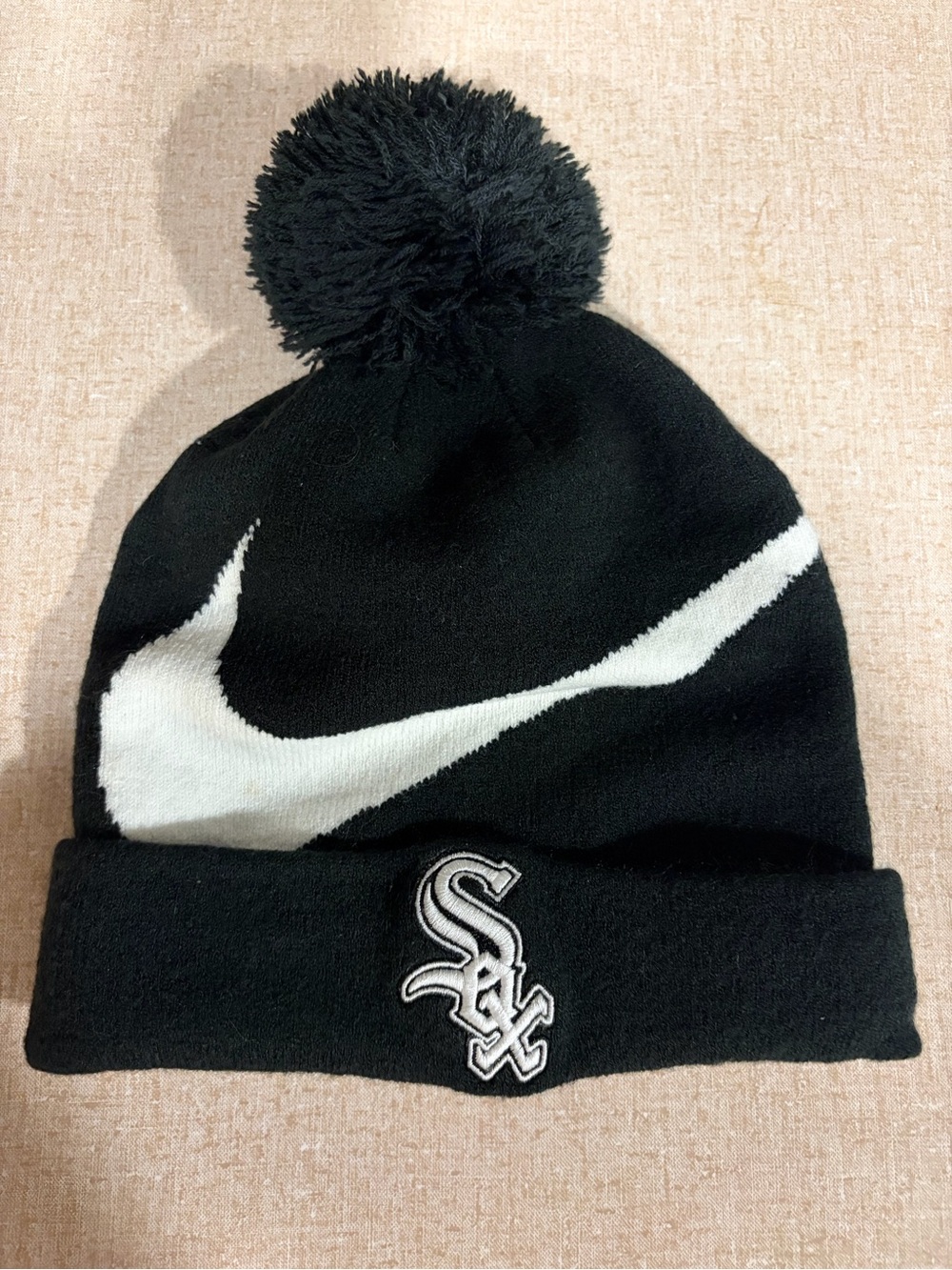 Nike Black and White Knit Pom Beanie with Team Logo